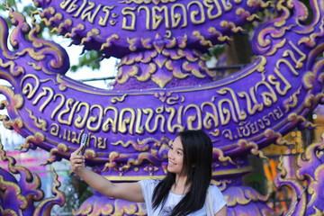 Mae Sai, ChaingRai, Thailand - December 1, 2023: Go to “Sky Walk Wat Phra That Doi Wao” Sky Walk, Mae Sai District, the northernmost point of Thailand.