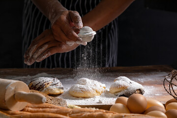 Bakery Chef Masterfully Icing a Freshly Baked Loaf, Capturing the Art of Bread Making and Pastry...