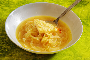 Homemade onion soup on plate