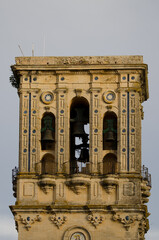 Naklejka premium Tower of the Minor Basilica of Santa Maria de la Asuncion. Arcos de la Frontera. Cadiz. Andalusia. Spain.
