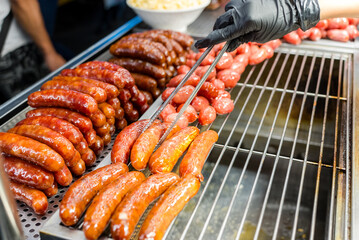 Grilled sausage sell in street market