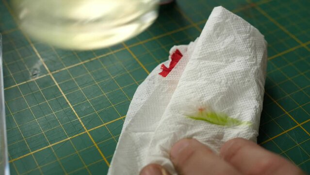 painting minis, miniatures for rpg game, wiping wet brush with tissue, paper towel