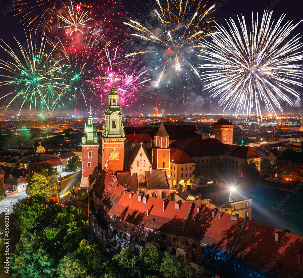 Wall mural new years firework display over the wawel castle in krakow, poland