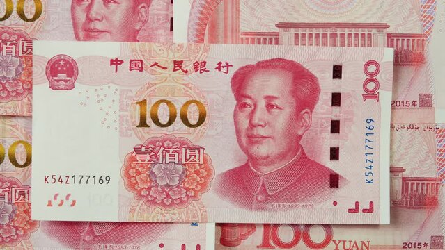 Detailed close up of 100 Yuan, the Chinese currency. 100 Renminbi the highest denomination of china's money. Footage of chinese banknotes. Counting money, finance