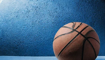 Stof per meter closeup detail of blue basketball ball texture background team sport concept sports background for product display banner or mockup © Kari