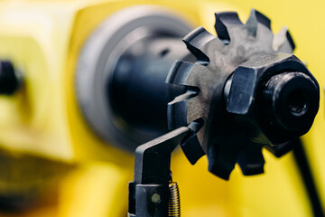 Closeup gears, impaled on shaft spline. Replacement spare part of industry machine tool