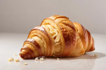 Fotobehang Croissant isolated and crispy on a table for the menu and pastry shop, french brioche Croissant, Italian Croissant © Pasqualino