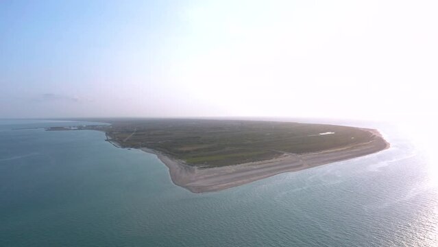 Aerial landscape panorama of Skagen Odde peninsula and Grenen - a meeting point of North and Baltic Sea (Skagerrak and Kattegat). North Jutland, Nordjylland, Denmark