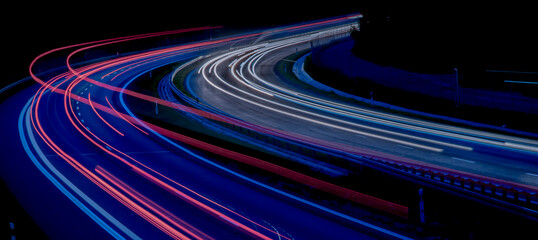 Night road lights. Lights of moving cars at night. long exposure