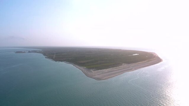 Aerial landscape panorama of Skagen Odde peninsula and Grenen - a meeting point of North and Baltic Sea (Skagerrak and Kattegat). North Jutland, Nordjylland, Denmark