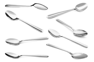 Silver spoon isolated on white, different sides. Kitchen utensil