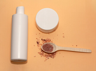 white jars for hair care with sea salt on a peach fuzz background