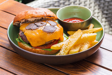Truffle burger and french fries cheese