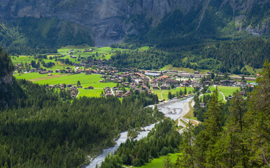 Fototapeta na wymiar Aerial view of mountain village in Kandersteg, Switzerland, sunny landscape