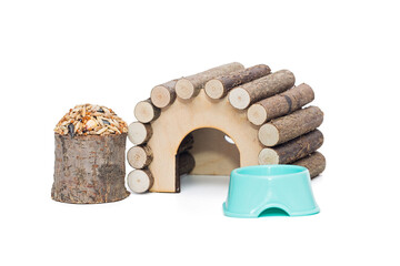 Wooden, natural house and a treat for a hamster