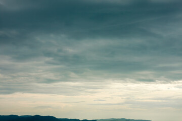 Dramatic moody sky after the storm with heavy clouds on the horizon 