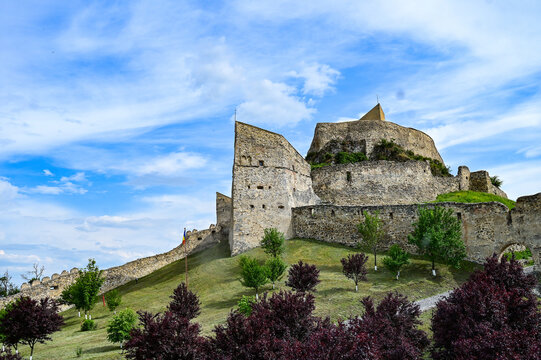 Famous castle ruins of Rupea Citadel, Cetatea Rupea, ruins of a castle in summer with a blue sky, Rupea, Transylvania, Romania	
