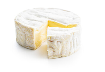 Brie type cheese with white mold. French camembert cheese isolated on white background.