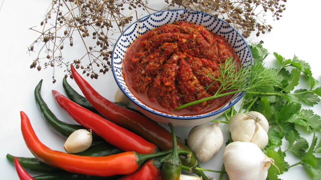 Abkhaz adjika made from hot pepper, coriander, garlic, Utskho-suneli spice and salt (Caucasian cuisine)