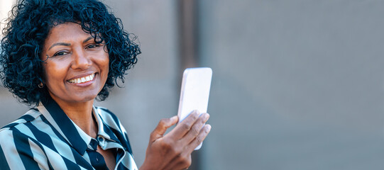 portrait of woman with mobile phone