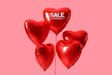 Heart-shaped balloons on pink background. Valentine's Day sale