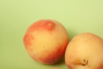 peaches on green background