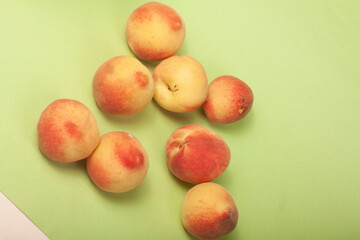 peaches on green background