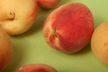 peaches on green background
