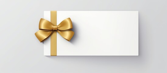 Blank white gift voucher with gold ribbon isolated on white - obrazy, fototapety, plakaty