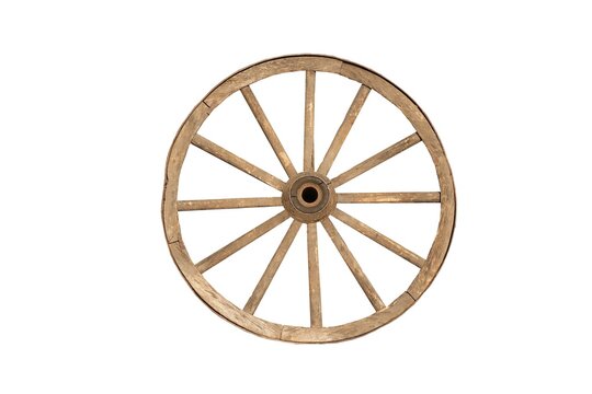 Old handmade wooden forged cart wheel on a white background.