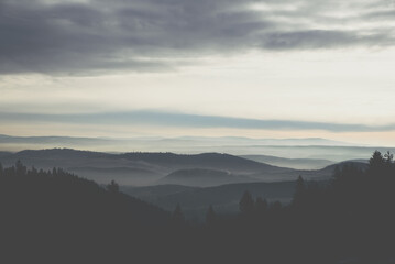 Soft fog in the mountains during sunset