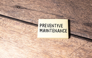 Preventive Maintenance text written on a notebook with pencils