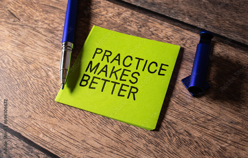 Poster practice makes better text written on a notebook with pencils