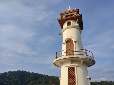 White lighthouse at the end of Bang Bao Pier in Ko Chang District, Trat, THAILAND.