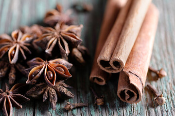 Close up of star anise,cinnamon and cloves on rustic background