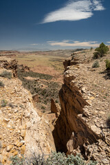 Looking Out Over Upper South Desert Overlook Through Crack In The Mesa