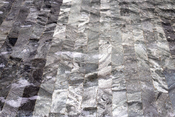 Water with dark grey floor tiles texture