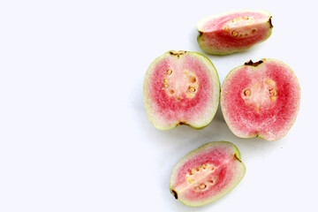 Fresh pink guava on white background.