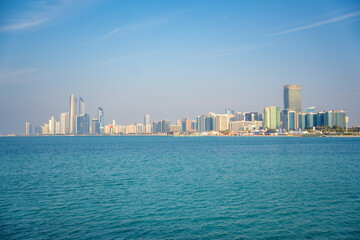 Panorama view of Abu Dhabi skyline with water, UAE
