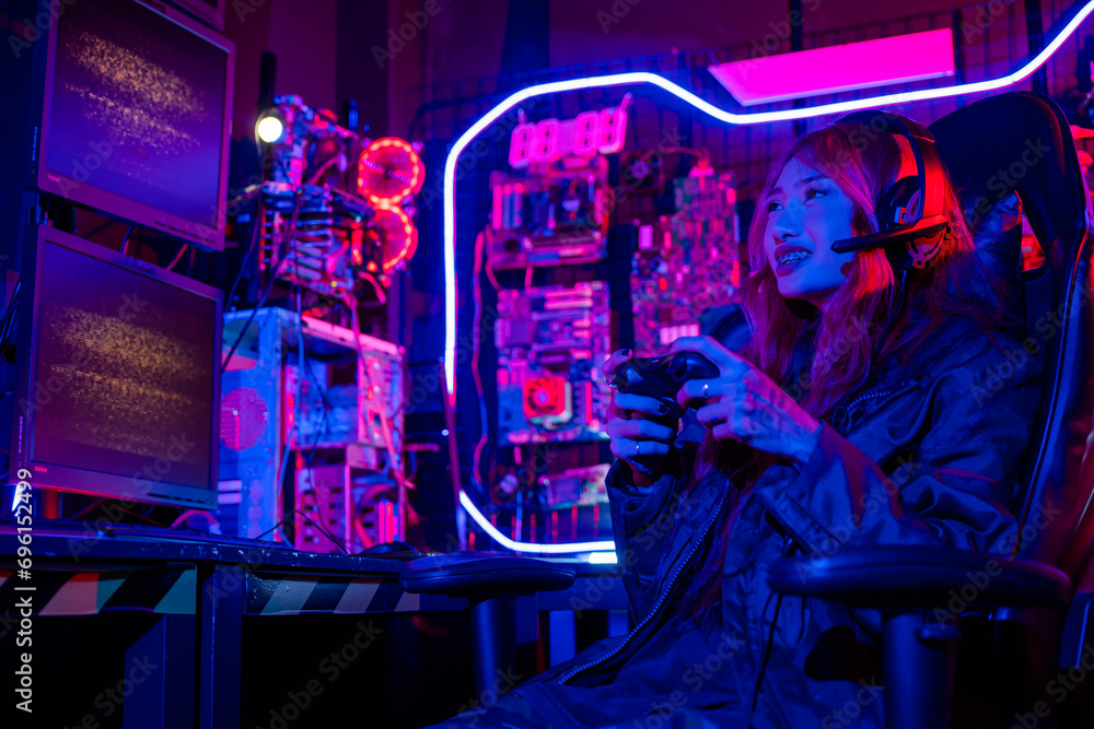 Poster gamer using joystick controller for virtual tournament plays online video game with computer neon li