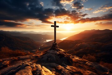 Cross on a rock in the mountains at sunrise, golden hour. Religion concept. 