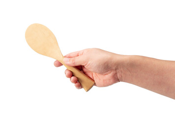 Wooden rice scoop held in hand isolated on white background. Shamoji is a Japanese tool for...