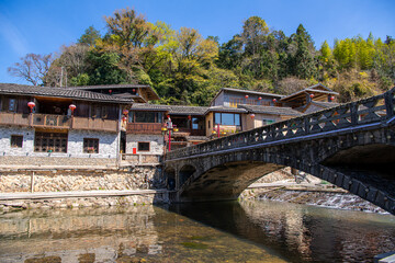 Fototapeta na wymiar The small houses in the Tuxi village around Tulou clusters and the river
