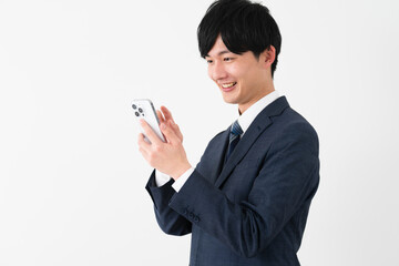 ビジネススーツを着ている若い男性　ビジネスイメージ