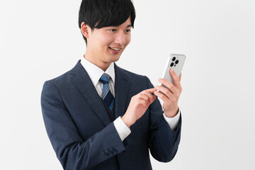 ビジネススーツを着ている若い男性　ビジネスイメージ