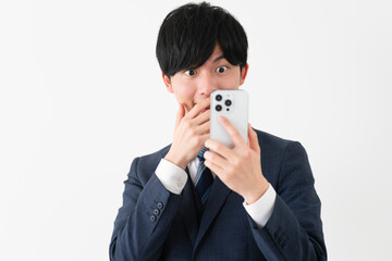 ビジネススーツを着ている若い男性　ビジネスイメージ	
