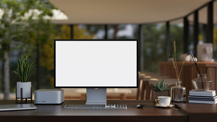 Modern contemporary office workspace with a computer mockup and accessories on a hardwood desk.