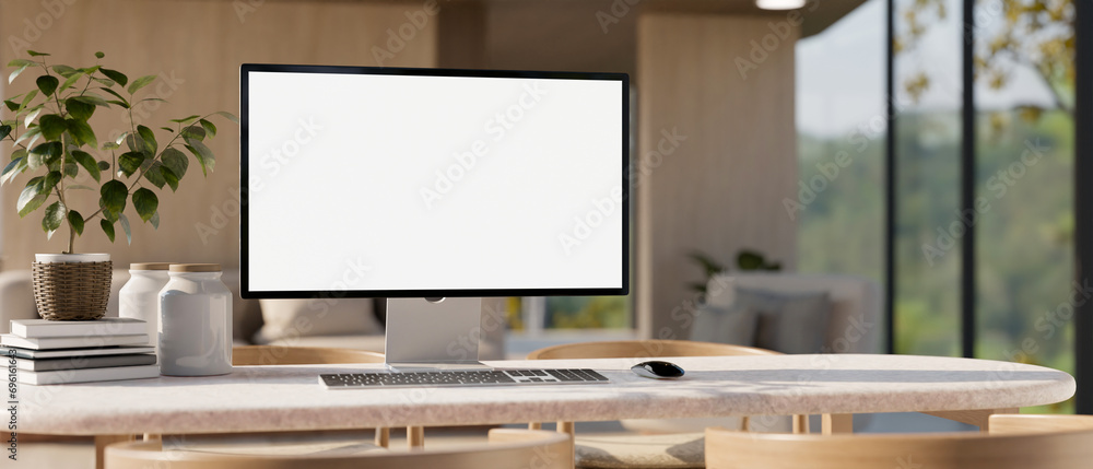 Canvas Prints a computer desk in a modern, luxury home. a white-screen computer mockup and accessories on a table.