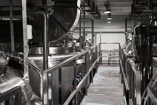 Metal ground near large cisterns for fermented milk products