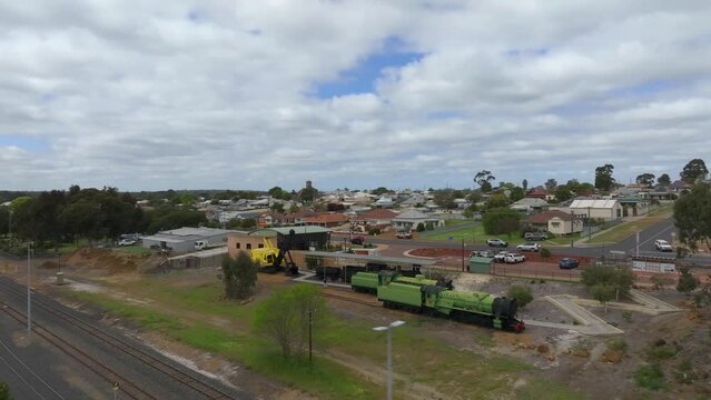 Snall country town of Collie in Western Ausralia. Flying around the visitor's centre, train and excavator on display.